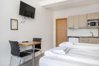 Kuchyň nebo kuchyňský kout v ubytování Stay Apartments Einholt