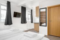 Postel nebo postele na pokoji v ubytování Stay Apartments Einholt