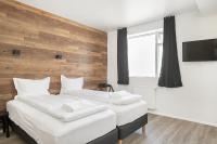 Postel nebo postele na pokoji v ubytování Stay Apartments Einholt
