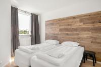 Postel nebo postele na pokoji v ubytování Stay Apartments Einholt
