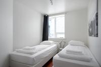 Postel nebo postele na pokoji v ubytování Stay Apartments Einholt