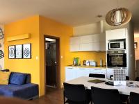 Kuchyň nebo kuchyňský kout v ubytování Apartmány Pinie Lipno