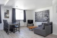 TV a/nebo společenská místnost v ubytování Stay Apartments Einholt