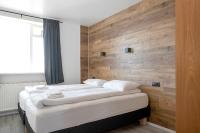 Postel nebo postele na pokoji v ubytování Stay Apartments Einholt