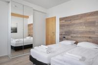 Postel nebo postele na pokoji v ubytování Stay Apartments Einholt
