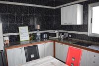 Kuchyň nebo kuchyňský kout v ubytování B&B La Caleta Zimmer 2