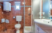 Kúpeľňa v ubytovaní Apartmani Lisičak A2+2