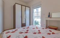 Posteľ alebo postele v izbe v ubytovaní Apartmani Lisičak A2+2