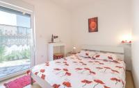 Posteľ alebo postele v izbe v ubytovaní Apartmani Lisičak A2+2