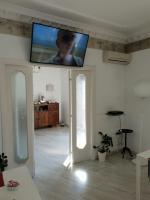 A television and/or entertainment centre at La Dimora del Conte
