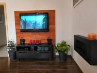 Televízia a/alebo spoločenská miestnosť v ubytovaní Apartmán II Terchová