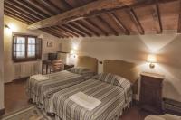 Posteľ alebo postele v izbe v ubytovaní Relais Santa Cristina