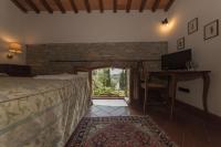 Posteľ alebo postele v izbe v ubytovaní Relais Santa Cristina