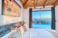 Posteľ alebo postele v izbe v ubytovaní Golden Haven Luxe Bungalow Resort