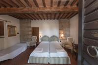 Posteľ alebo postele v izbe v ubytovaní Relais Santa Cristina