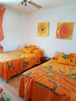 Postel nebo postele na pokoji v ubytování Apartamento frente al mar