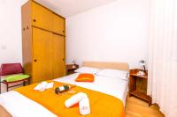 Posteľ alebo postele v izbe v ubytovaní Apartments Mira Mark