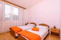 Posteľ alebo postele v izbe v ubytovaní Apartments Mira Mark