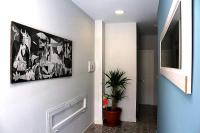 Televízia a/alebo spoločenská miestnosť v ubytovaní Apartamentos Lola Beach
