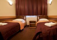 Łóżko lub łóżka w pokoju w obiekcie Hotel Vitalia
