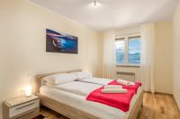 Posteľ alebo postele v izbe v ubytovaní Orchidea apartment