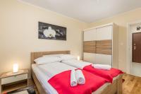 Posteľ alebo postele v izbe v ubytovaní Orchidea apartment