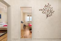 Posteľ alebo postele v izbe v ubytovaní Orchidea apartment