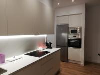 Kuchnia lub aneks kuchenny w obiekcie ARENA Apartamento - Perla Boutique Apartamentos