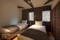 THE MACHIYA VILLA 三条しらかわ小路にあるベッド