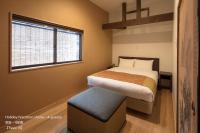 THE MACHIYA VILLA 三条しらかわ小路にあるベッド