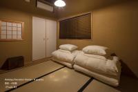 THE MACHIYA VILLA 三条しらかわ小路にあるベッド