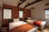 THE MACHIYA VILLA 三条しらかわ小路にあるベッド