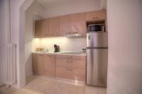 Kuchyňa alebo kuchynka v ubytovaní L'appartement blanc dans le centre de Glyfada