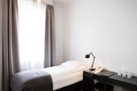 Postel nebo postele na pokoji v ubytování Fosshotel Rauðará
