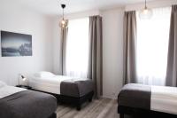 Postel nebo postele na pokoji v ubytování Fosshotel Rauðará