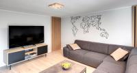 Televízia a/alebo spoločenská miestnosť v ubytovaní Agrodomek - komfortowy Apartament na Górnym Śląsku