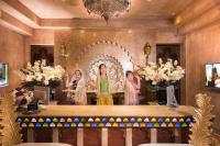a group of three women standing behind a altar at Kenting Amanda Hotel in Nanwan