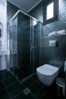 A bathroom at Anemos Luxury Apartments