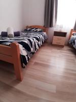 Postel nebo postele na pokoji v ubytování Apartman Noah