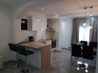 Kuchyň nebo kuchyňský kout v ubytování Apartman Noah