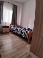 Postel nebo postele na pokoji v ubytování Apartman Noah