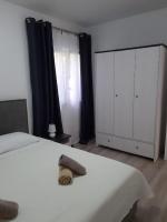 Postel nebo postele na pokoji v ubytování Apartman Noah