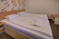Postel nebo postele na pokoji v ubytování Hotel Mida