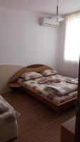 Postel nebo postele na pokoji v ubytování Sea Bedroom Apartments