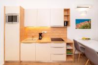 Kuchyňa alebo kuchynka v ubytovaní Apartments Kricin II