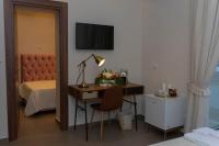 A television and/or entertainment centre at “A piazzetta”