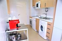 Kuchyň nebo kuchyňský kout v ubytování Apartamento Litoral Mar 9