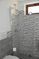 A bathroom at Domus Carlotta Apartment with sea view Villasimius