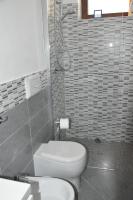 A bathroom at Domus Carlotta Apartment with sea view Villasimius