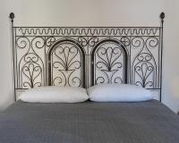A bed or beds in a room at CRUdiS Luxury rooms